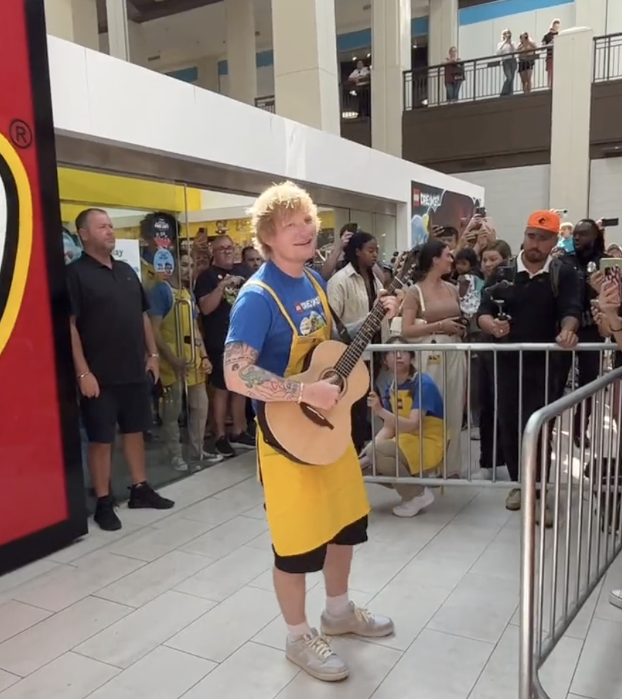 Ed Sheeran singing at LEGO Store